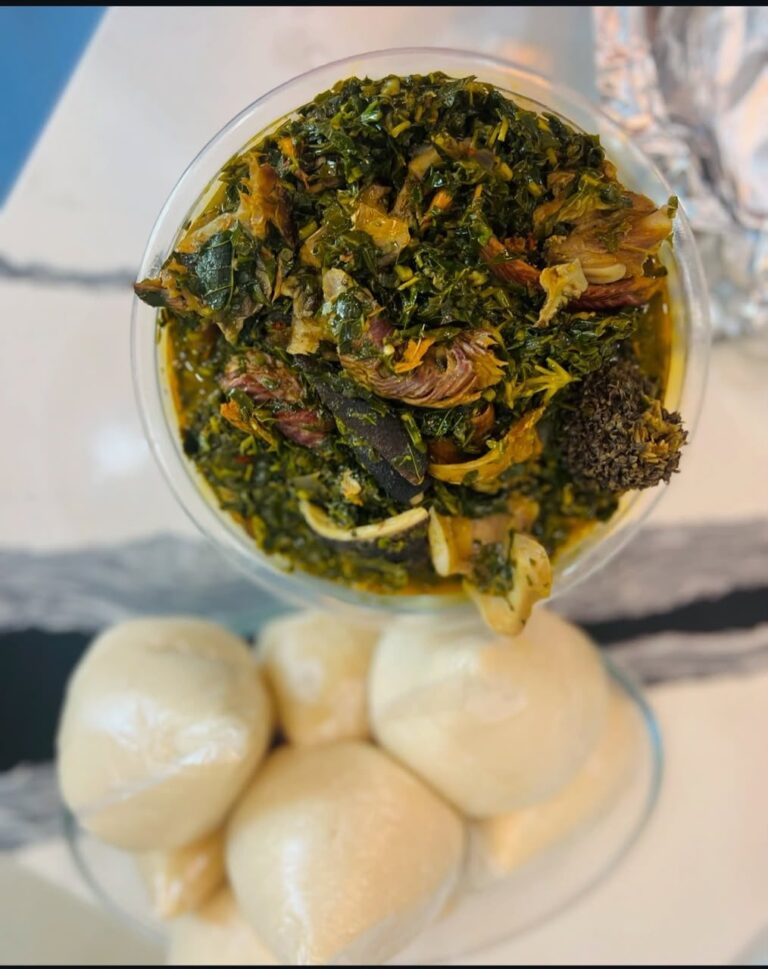 Assorted vegetable soup served with swallow